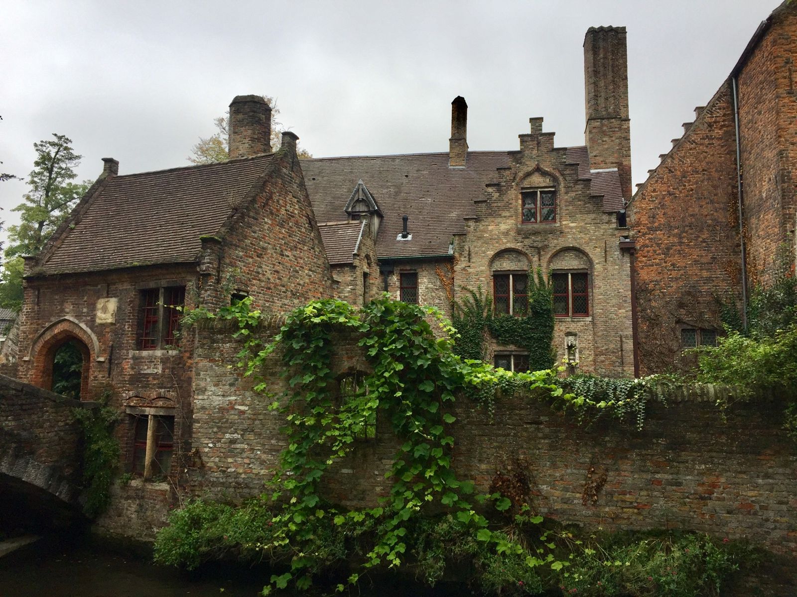 Medieval brick houses beside a canal in Bruges