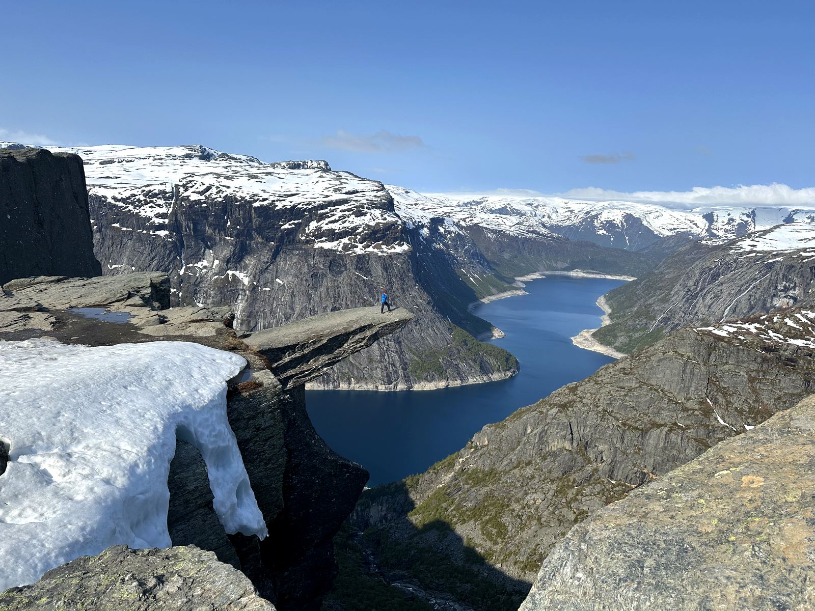 The Trolltunga rock ledge high above a fjord lake